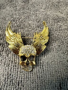 Gold Winged Skull Brooch with Crystal Accents - Statement Pin